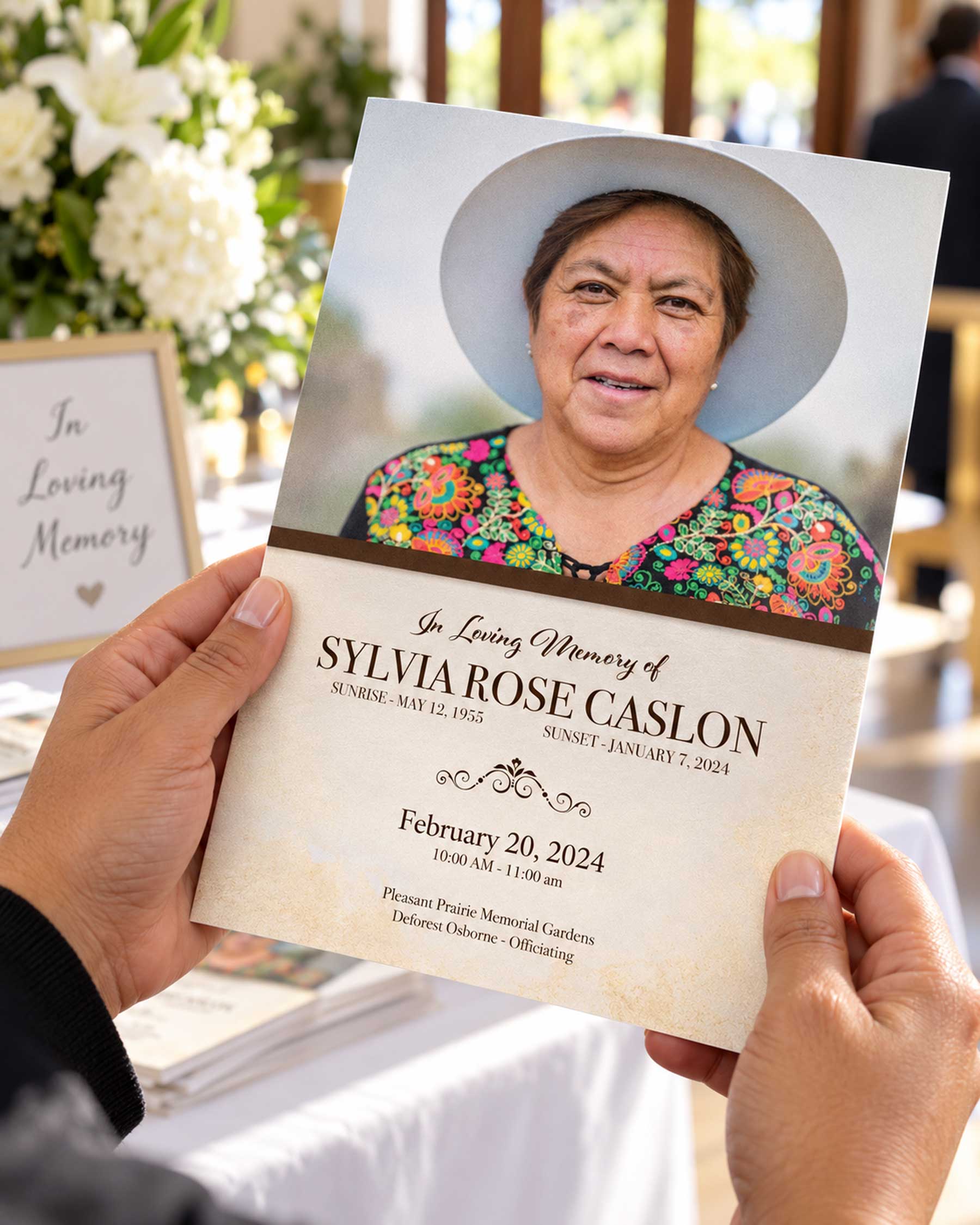 Hands holding a printed memorial program in a church setting